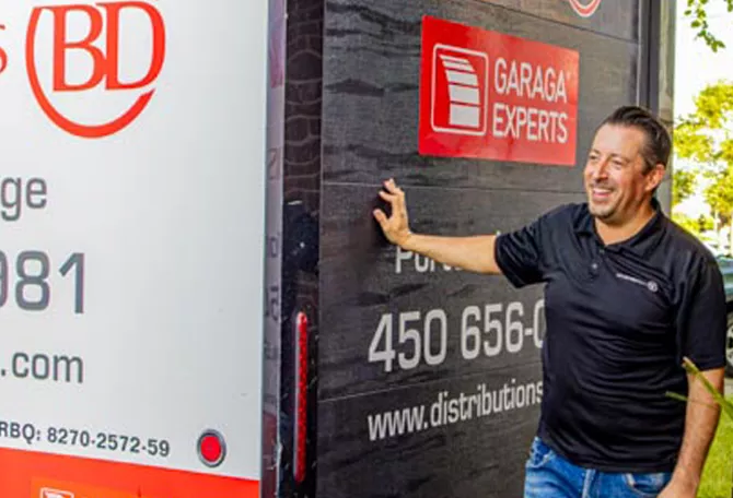 Garage door technician with his truck BD Distribution